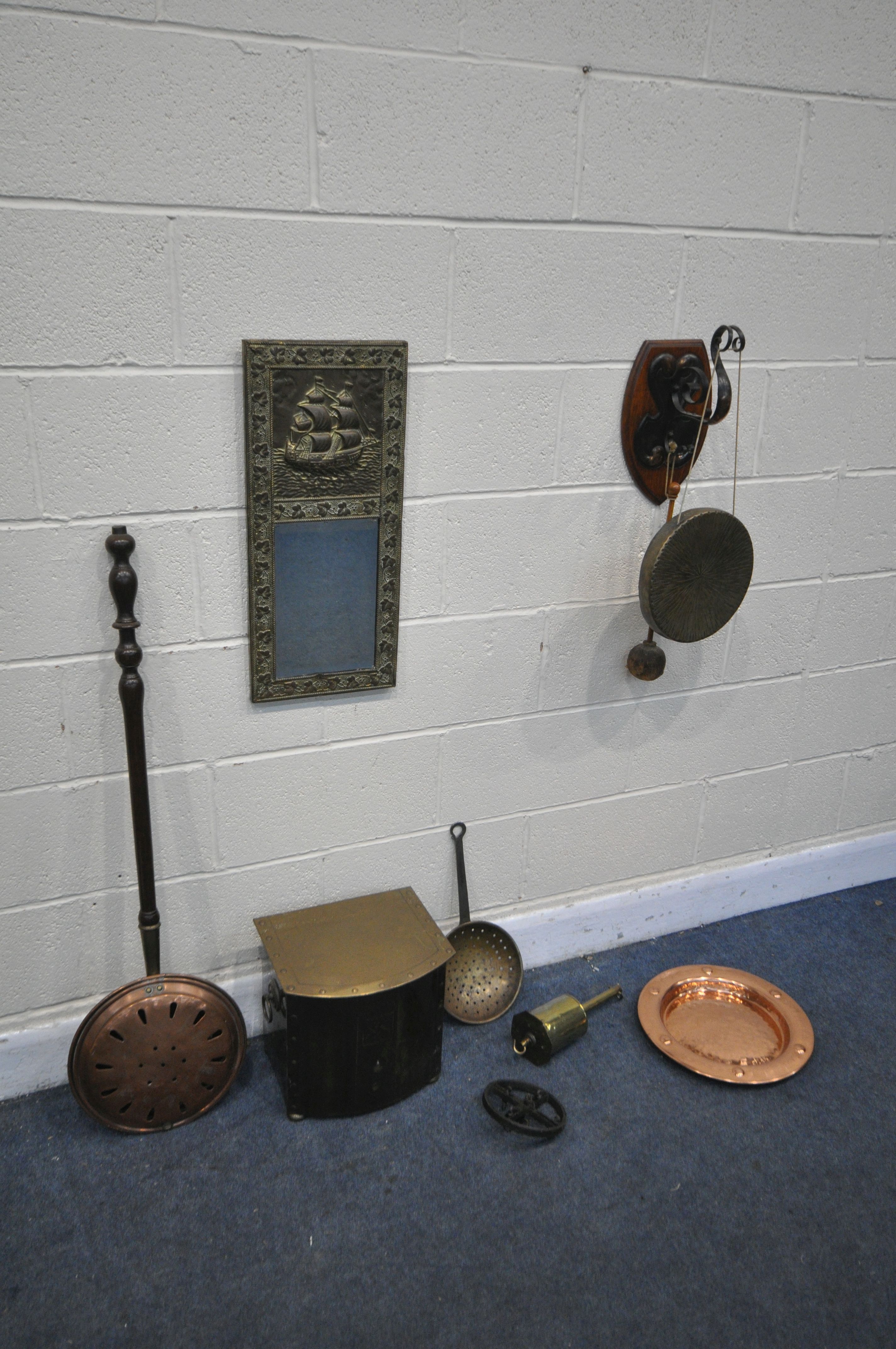 A SELECTION OF BRASS AND COPPERWARE, to include a wall gong with beater, a brass coal bucket, a