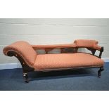 AN EDWARDIAN MAHOGANY CHAISE LONGUE, with a single scrolled arm, and a rounded back, length 186cm