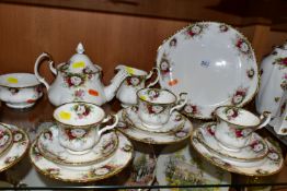 A ROYAL ALBERT 'CELEBRATION' PATTERN TEA SET, comprising two cake plates (one marked as second