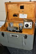 A STEREOSCOPIC TELESCOPE, made in USSR N643257in a wooden case, wired with a Mammant & Morgan Ltd