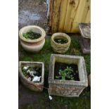 FOUR MODERN COMPOSITE GARDEN PLANTERS including a square planter with foliate details to each side