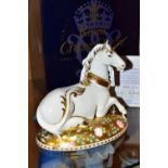 A BOXED ROYAL CROWN DERBY LIMITED EDITION PAPERWEIGHT, 'Mythical Unicorn', with certificate numbered