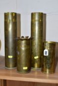 A COLLECTION OF FOUR PIECES OF TRENCH ART, comprising two plain brass shell cases, height 35cm, a