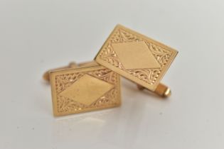 A PAIR OF 9CT GOLD CUFFLINKS, each of a rectangular form with a floral pattern and vacant cartouche,