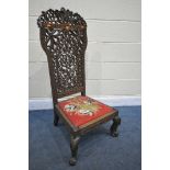 A 19TH CENTURY ANGLO INDIAN HARDWOOD SIDE CHAIR, the back decorated with open foliate carving,