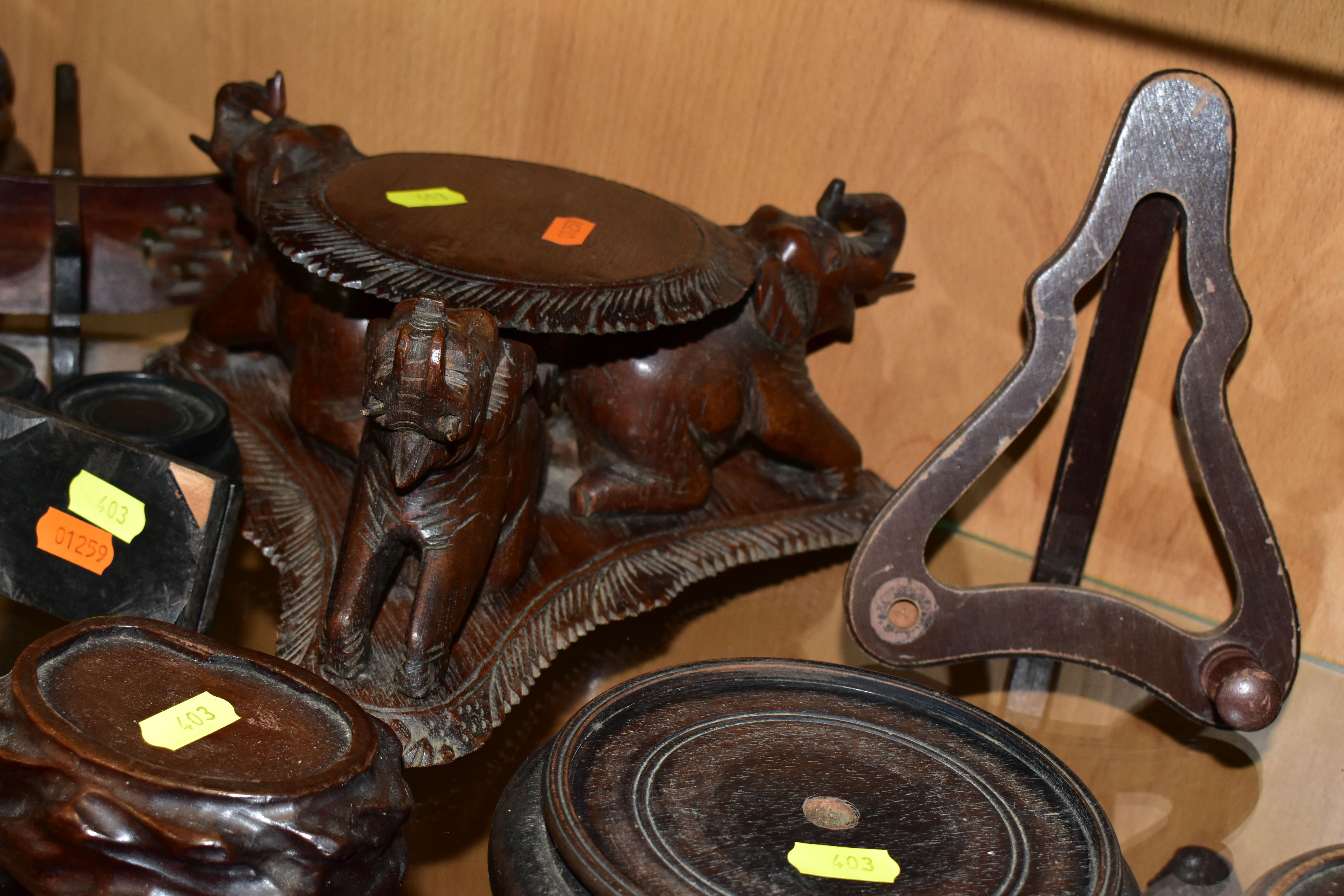 A QUANTITY OF WOODEN VASE STANDS, comprising an Arts & Crafts style tobacco jar with carved - Image 11 of 13