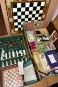 A BOX OF ASSORTED CHESS SETS, PLAYING CARDS AND DOMINOS, to include two unused sets of Bridge