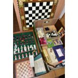 A BOX OF ASSORTED CHESS SETS, PLAYING CARDS AND DOMINOS, to include two unused sets of Bridge