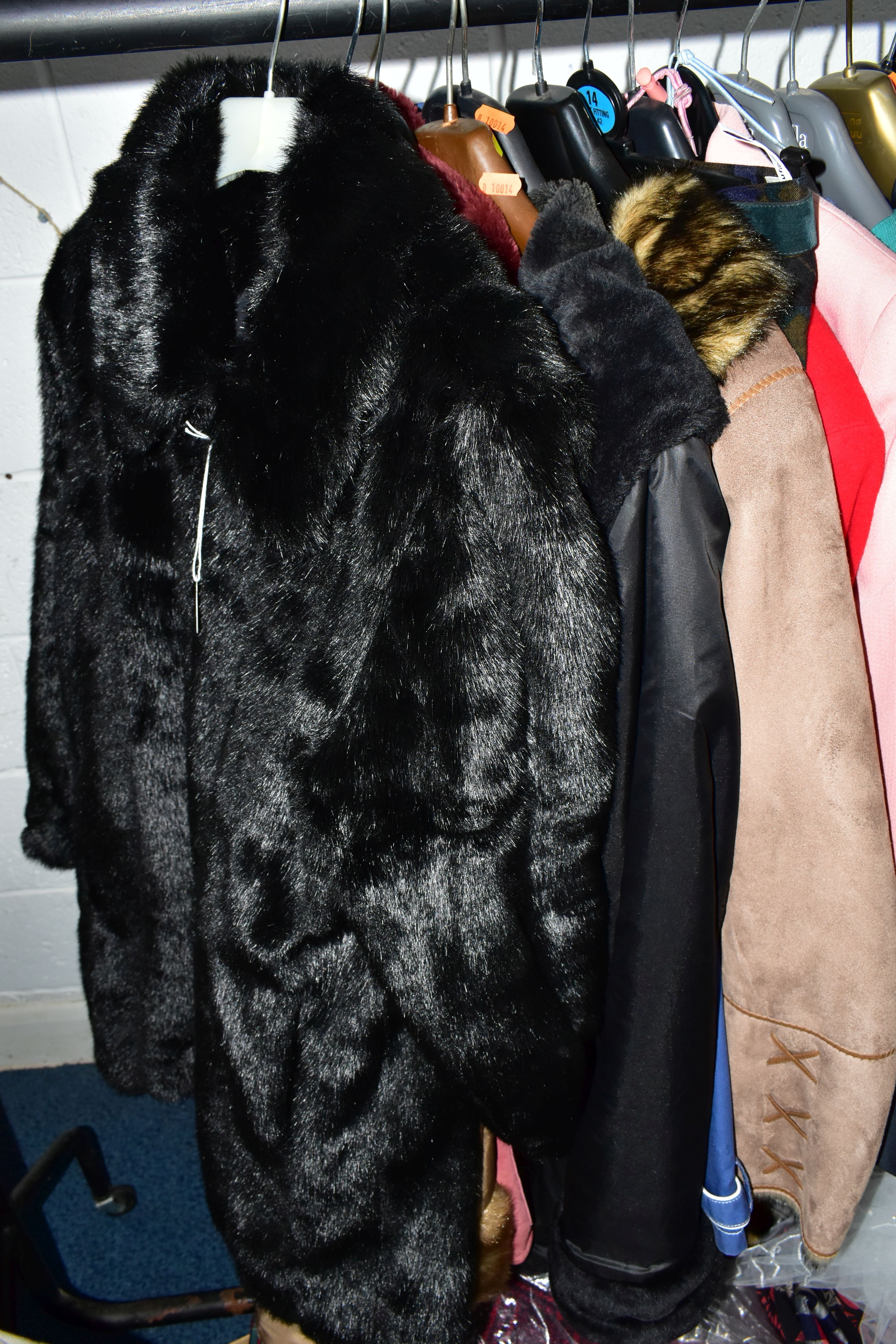 A RAIL AND TWO BOXES OF LADIES CLOTHING, to include coats, jackets, faux furs, sheepskins, skirts - Image 3 of 19