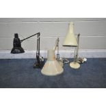 A BLACK FINISH HERBERT TERRY ANGLE POISE DESK LAMP, a cream angle poise desk lamp, and another