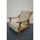 A MID CENTURY SUPAREST OPEN ARMCHAIR, with floral upholstery (condition - rickety frame, surface