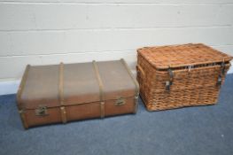 A WICKER BASKET, width 76cm x depth 46cm x height 49m, along with vintage travelling trunk (