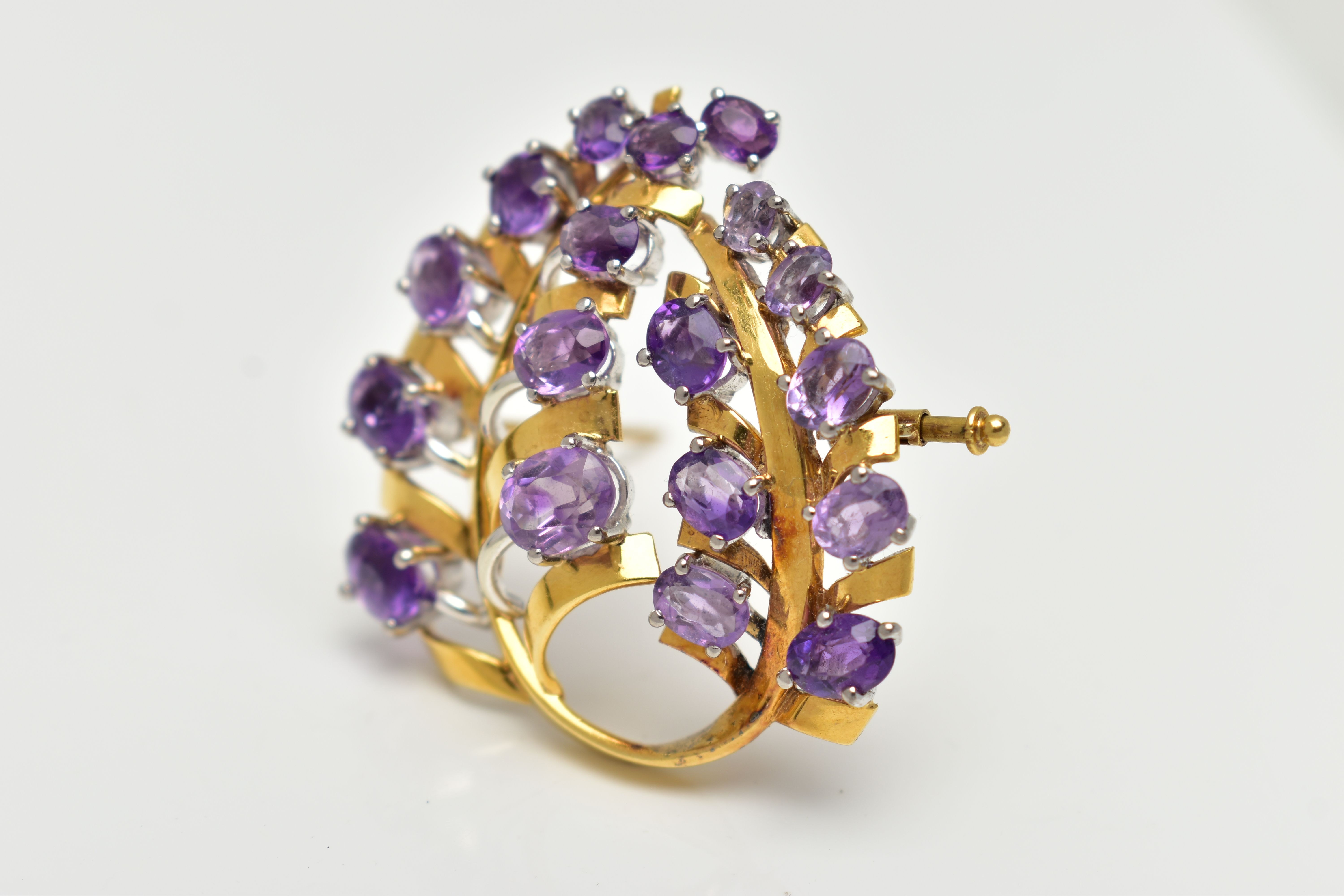 A YELLOW METAL AMETHYST 'LOTOS' SPRAY BROOCH, foliage spray design set with eighteen oval cut - Image 3 of 6