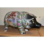A LARGE CHINESE ROSE MEDALLION STYLE PIGGY BANK, with black plastic stopper, red printed mark to the