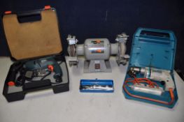 A SIP 6 BENCH GRINDER along with a Black and Decker KR650RE drill, a Wolf drill (all PAT pass and