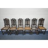 A HARLEQUIN SET OF SIX CARVED OAK CHAIRS, with bergère seats (condition:-some frames rickety, six