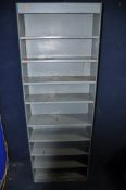 A SET OF STEEL SHELVING with nine shelves measuring width 67cm x depth 27cm x height 189cm and a