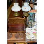 A GROUP OF OIL LAMPS, SMALL STAMP COLLECTION AND WOODEN BOOK STANDS, comprising an Oriental carved