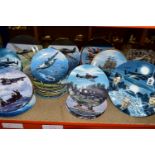 THIRTY NINE MILITARY THEMED COLLECTORS PLATES, mainly decorated with second world war aircraft, to