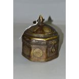 A BRONZE OCTAGONAL BOX, with domed lid, teardrop shaped finial and handle, applied flower symbols,