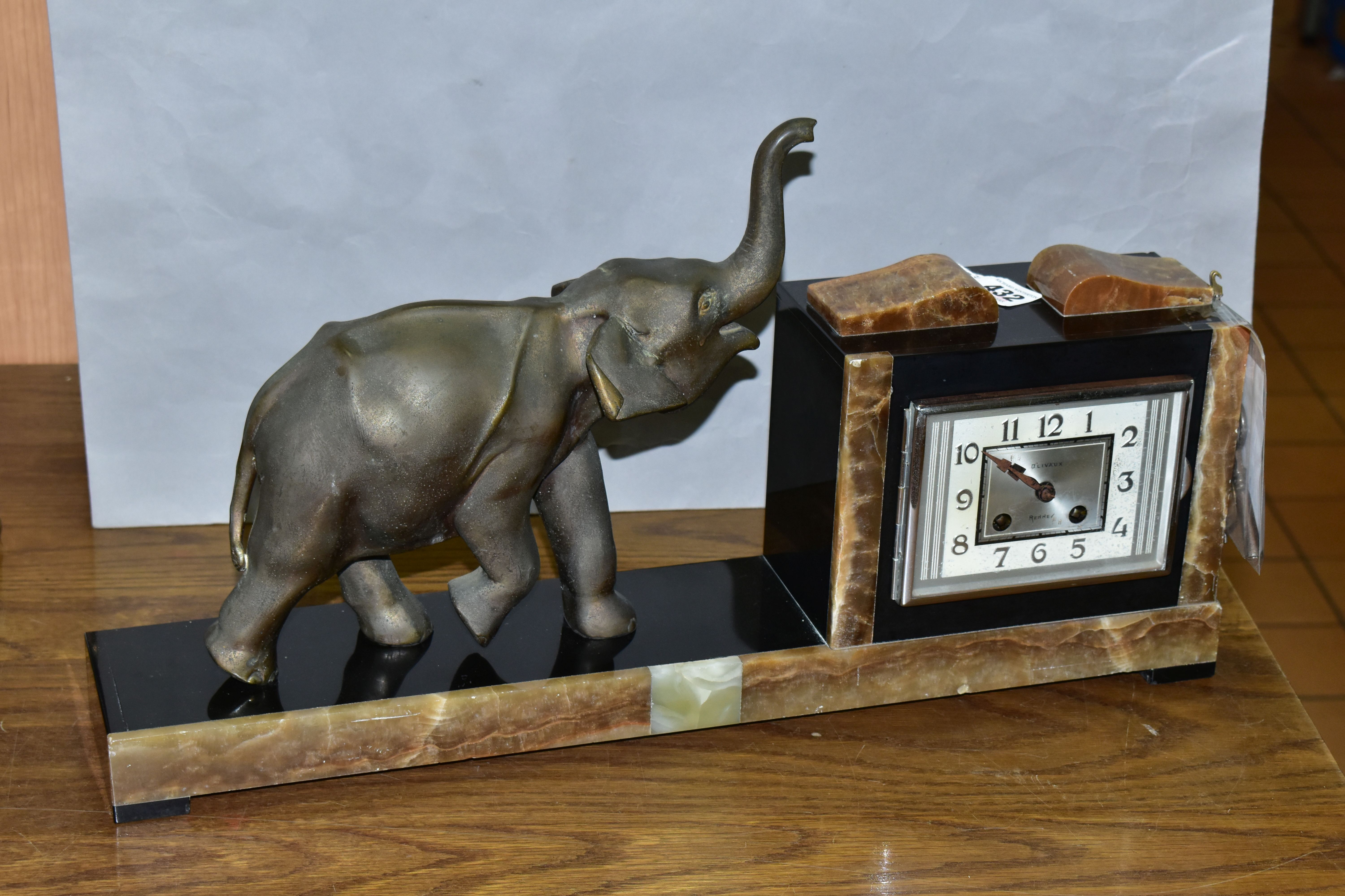 A FRENCH ART DECO MARBLE MANTEL CLOCK, Olivaux Renn, with key and pendulum and figure of an elephant