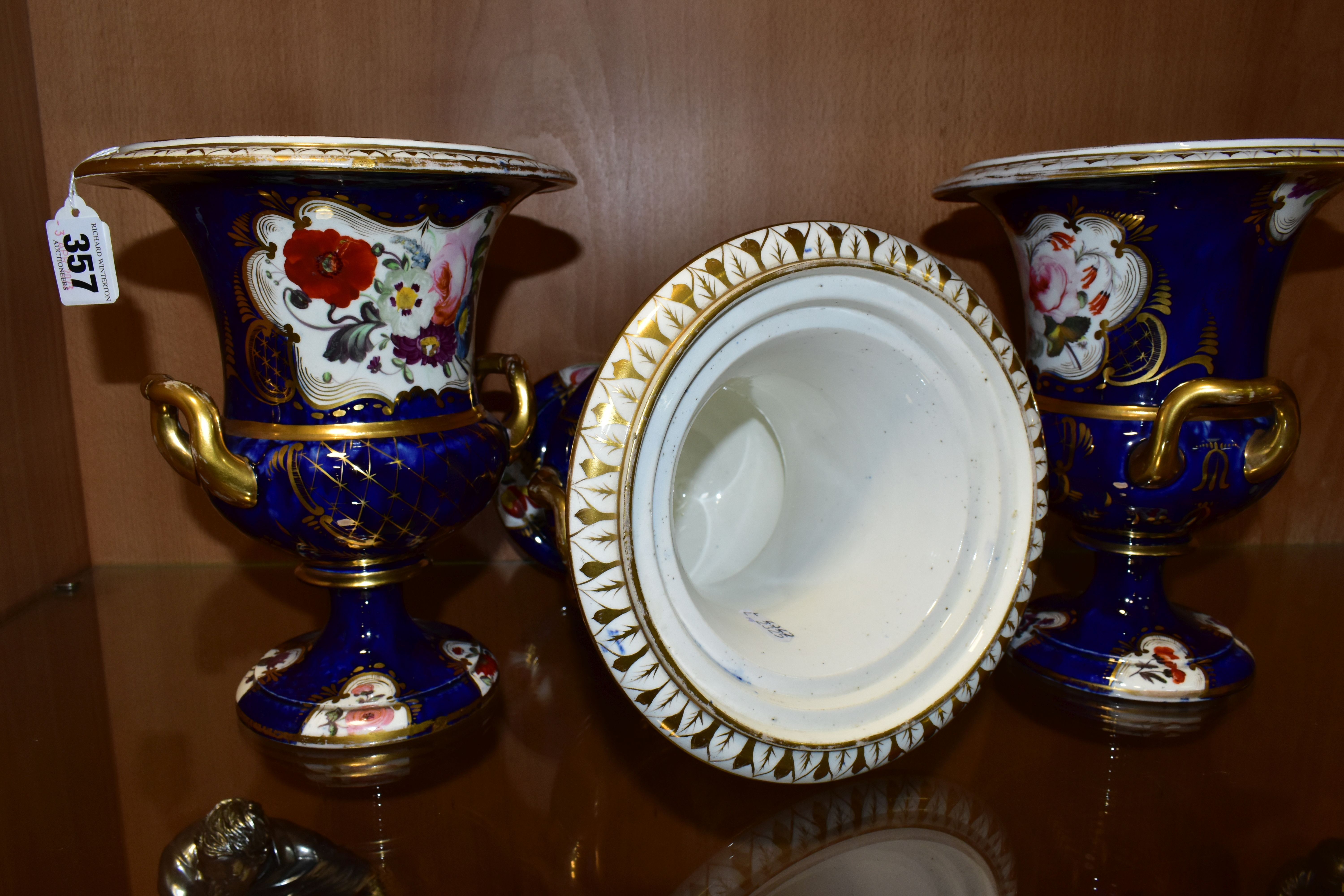 THREE VICTORIAN PORCELAIN TWIN HANDLED URNS, hand painted with panels of flowers on a fish scale - Image 7 of 8