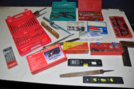 A SELECTION OF CASED TOOLS to include three driver/socket sets, cased scalpel set, cased tap and die