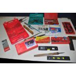 A SELECTION OF CASED TOOLS to include three driver/socket sets, cased scalpel set, cased tap and die