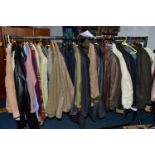 ONE RAIL OF GENTLEMEN'S CLOTHING, to include suits, tweed jackets, sheepskin coat, sweaters,