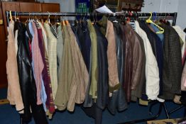 ONE RAIL OF GENTLEMEN'S CLOTHING, to include suits, tweed jackets, sheepskin coat, sweaters,