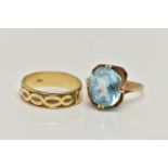 TWO 9CT GOLD RINGS, the first designed with a double four claw set, oval cut light blue topaz, in an