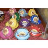 TEN AYNSLEY TEA CUPS AND SAUCERS, comprising three footed cups and three saucers in yellow, pale