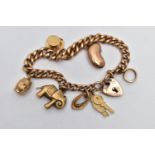 A 9CT GOLD CHARM BRACELET, hollow curb link bracelet, each link stamped 9c, fitted with a heart
