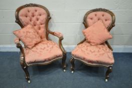 A VICTORIAN WALNUT SPOON BACK ARMCHAIR, with floral pink fabric and open armrests, on ceramic