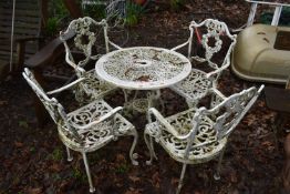 A WEATHERED WHITE PAINTED ALUMINIUM CIRCULAR GARDEN TABLE, diameter 68cm x height 66cm, and four