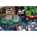 THREE BOXES OF REMOTE CONTROLLED CARS, CAR RADIOS AND CAMERAS, to include an Interceptor Motor Works