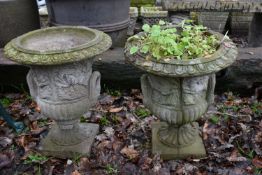 A PAIR OF WEATHERED COMPOSITE CAMPAGNA GARDEN URNS, 38cm diameter x height 46cm