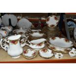 ROYAL ALBERT 'OLD COUNTRY ROSES' PATTERN DINNERWARE, comprising two gravy jugs (one marked as second