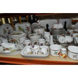 A LARGE QUANTITY OF ROYAL WORCESTER 'EVESHAM' PATTERN DINNERWARE, comprising four lidded casserole