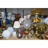 A QUANTITY OF LAMPS AND SHADES, oil lamps and electric table lamps, to include a tall Duplex oil