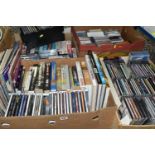 FOUR BOXES OF MUSIC to include over 240 CD's, twenty+ VHS video cassettes, twenty+ books and forty-