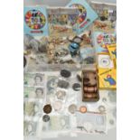 TWO PLASTIC TRAYS OF MIXED COINAGE AND BANKNOTES, to include an 1892 USA Barber Half Dollar coin,