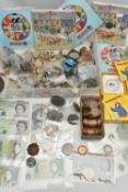 TWO PLASTIC TRAYS OF MIXED COINAGE AND BANKNOTES, to include an 1892 USA Barber Half Dollar coin,