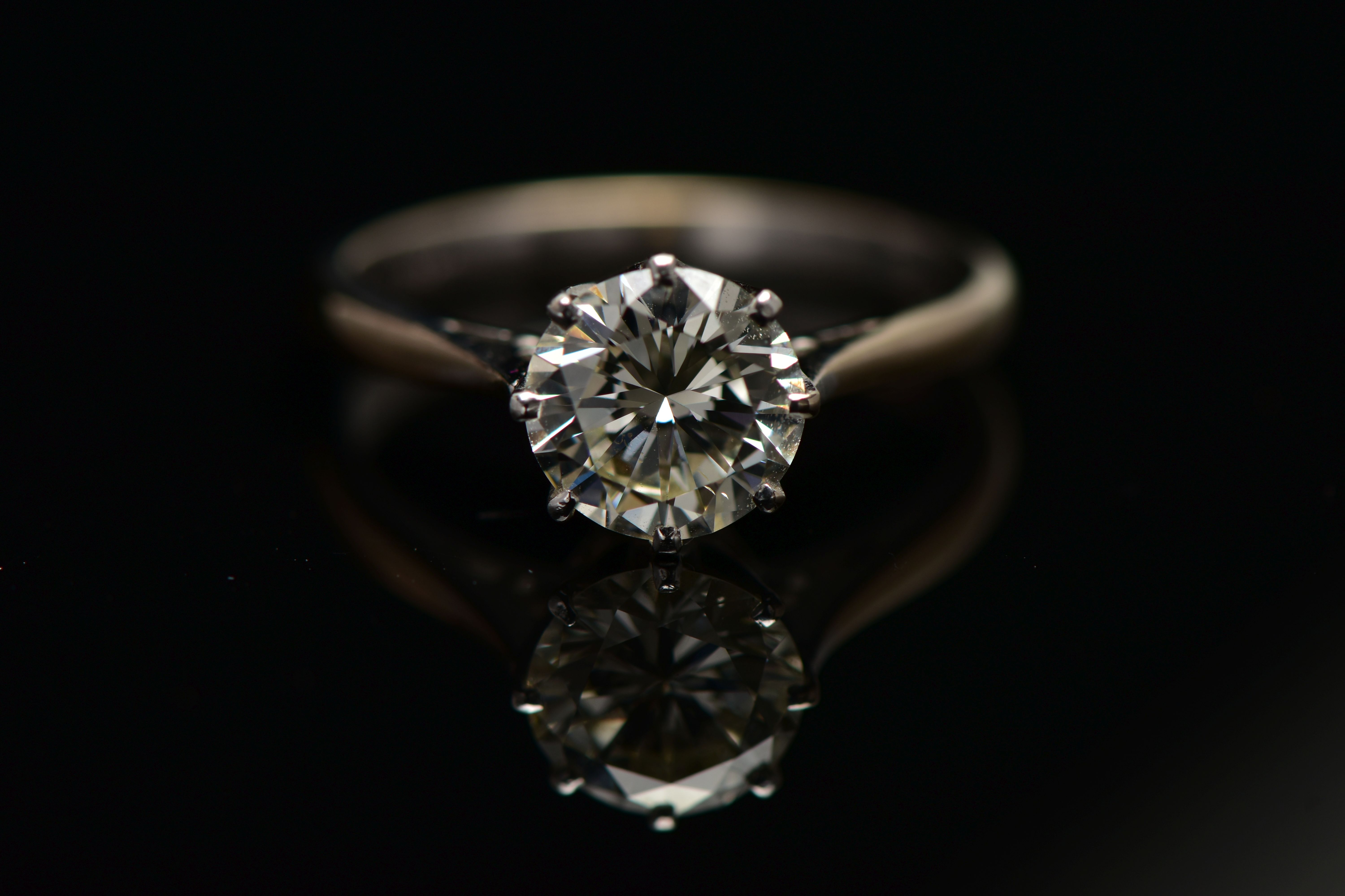 A MODERN SINGLE STONE DIAMOND RING, round brilliant cut diamond, estimated carat weight 1.50ct, - Image 11 of 12