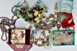 A SMALL BAG OF JEWELLERY AND BEADS, to include a pair of white metal butterfly drop earrings, with