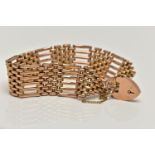 A 9CT WIDE GATE BRACELET, six bar bracelet with textured detailed oval links, approximate band width