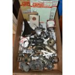 A BOX OF VINTAGE BICYCLE PARTS AND ACCESSORIES, to include various lights and lamps, saddle, nuts