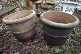 A PAIR OF LARGE WEATHERED TERRACOTTA CIRCULAR PLANTERS, diameter 57cm x height 45cm (2)
