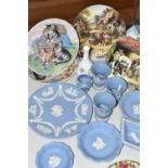 A GROUP OF WEDGWOOD BLUE JASPERWARE AND CABINET PLATES, comprising a Wedgwood bud vase, nine