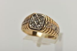 A 9CT GOLD DIAMOND SIGNET RING, of a square outline, set with nine single cut diamonds, estimated